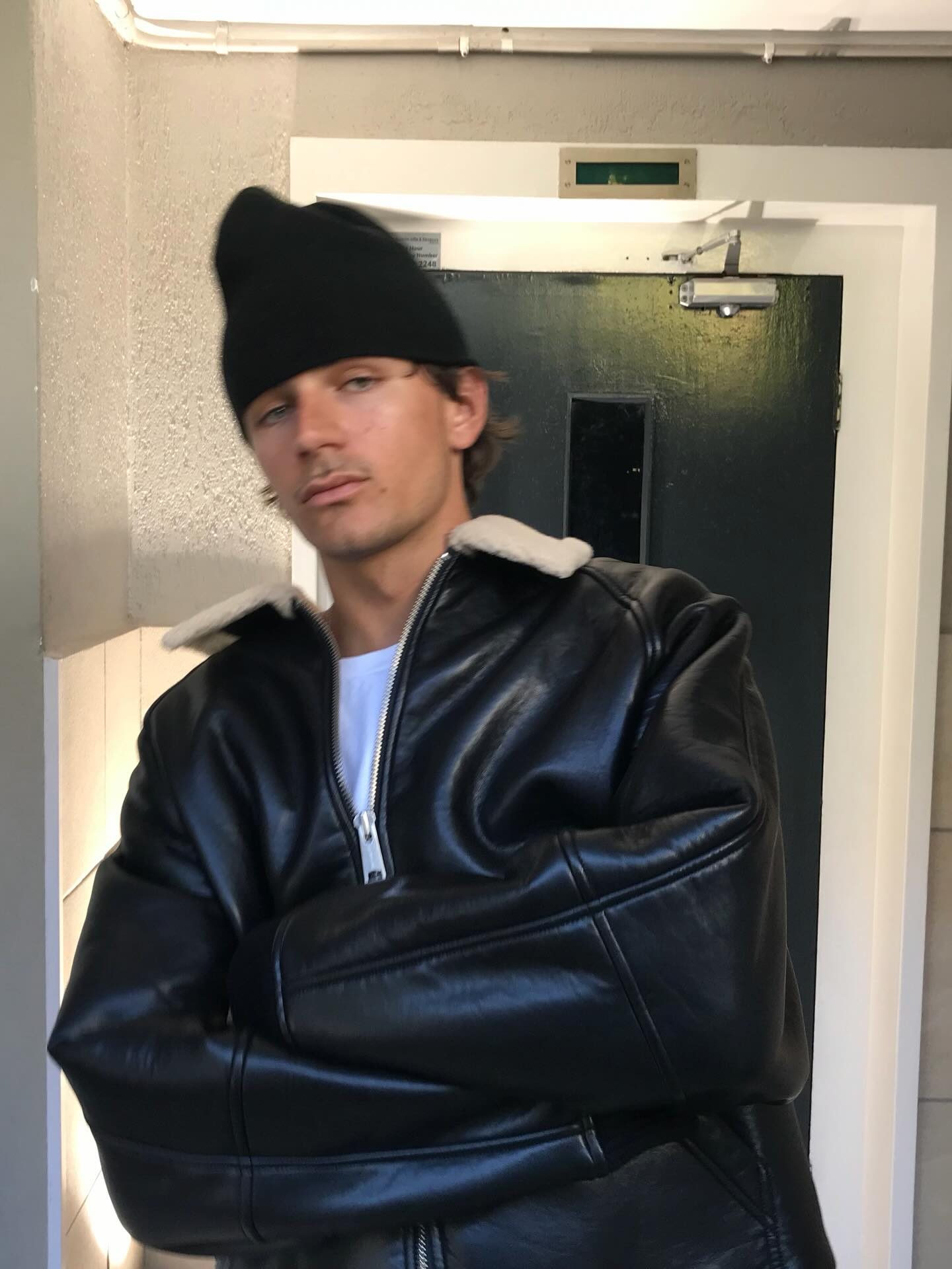 Jupp Simon wearing a black leather jacket