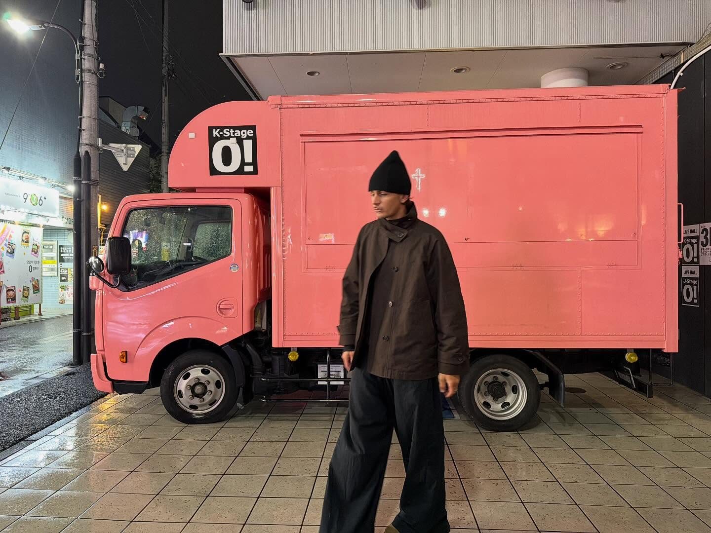 Night photograph with pink truck